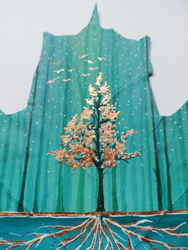 koppar färgat träd med rötter på målat löv